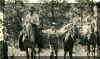 Gitting_Ready_For_The_Ride-Wm_McPherson_between_horses.JPG (357082 bytes)